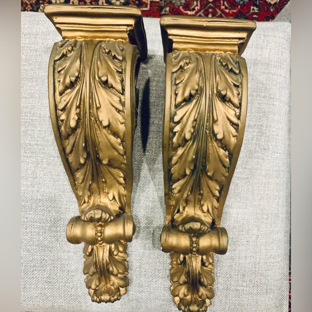 Ornate gold wall sconces